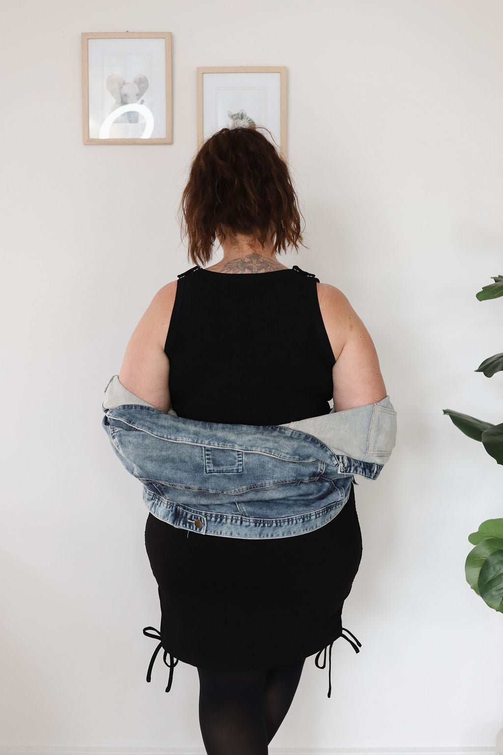 Black ribbed mini dress with breastfeeding access